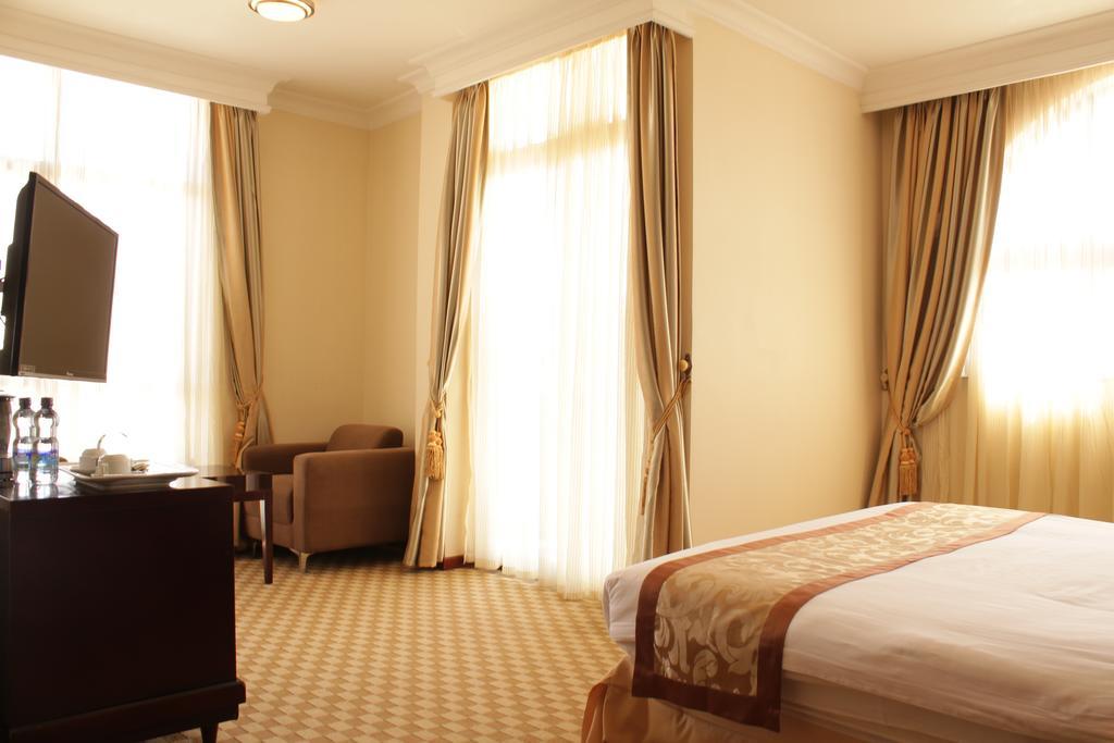 Caravan Hotel Адис Абеба Стая снимка