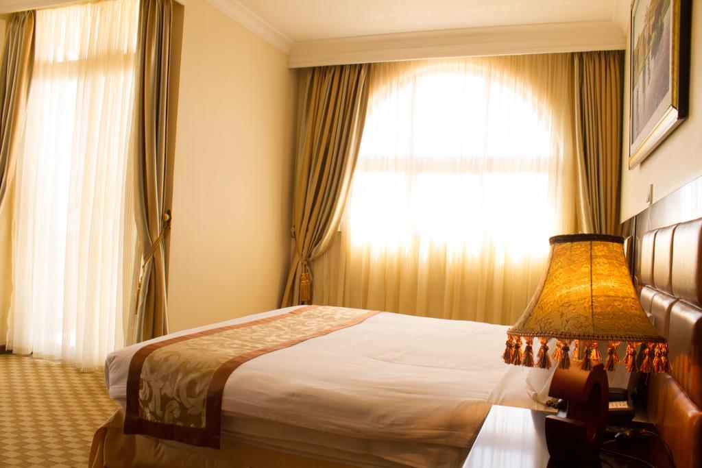 Caravan Hotel Адис Абеба Стая снимка