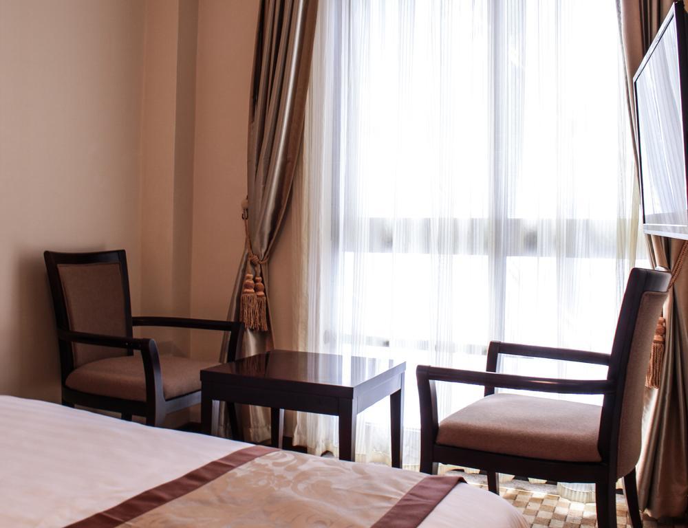 Caravan Hotel Адис Абеба Стая снимка